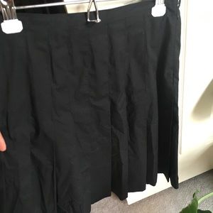 Black Chaps pleated skirt.